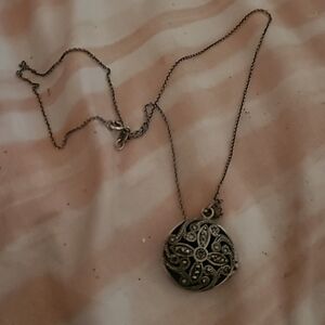 A vintage sterling silver necklace with Locket